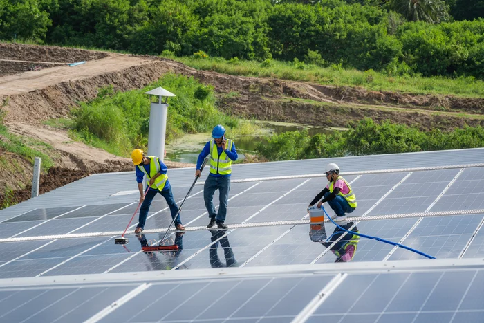 solar-power-washing-labor-working-on-cleaning-sola